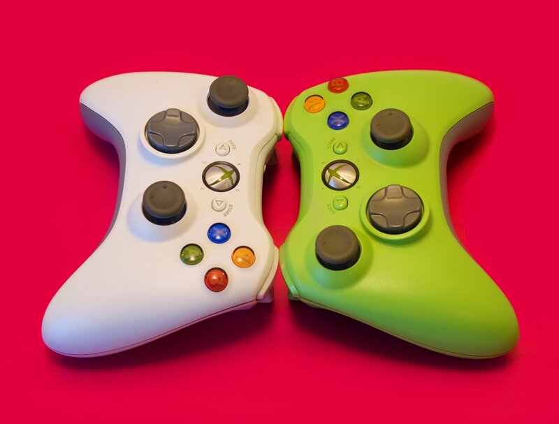 Xbox controllers on red