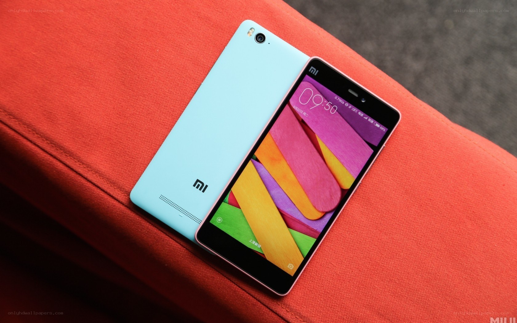 Xiaomi Mi 4 smartphone on red fabric