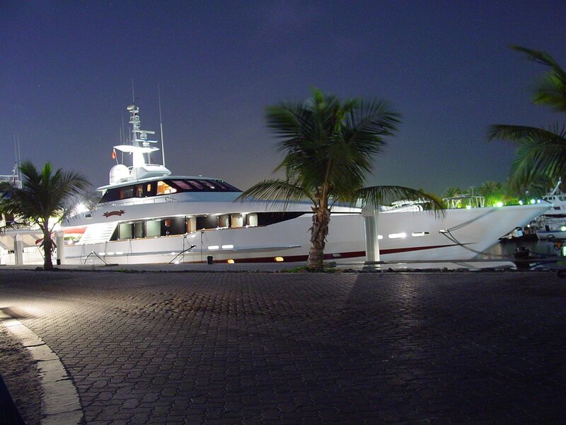 Yacht at night in marina