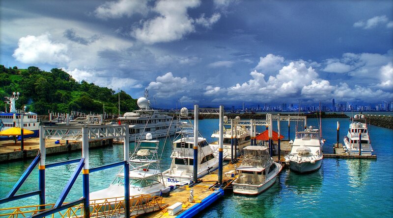 Yachts docked at a marina