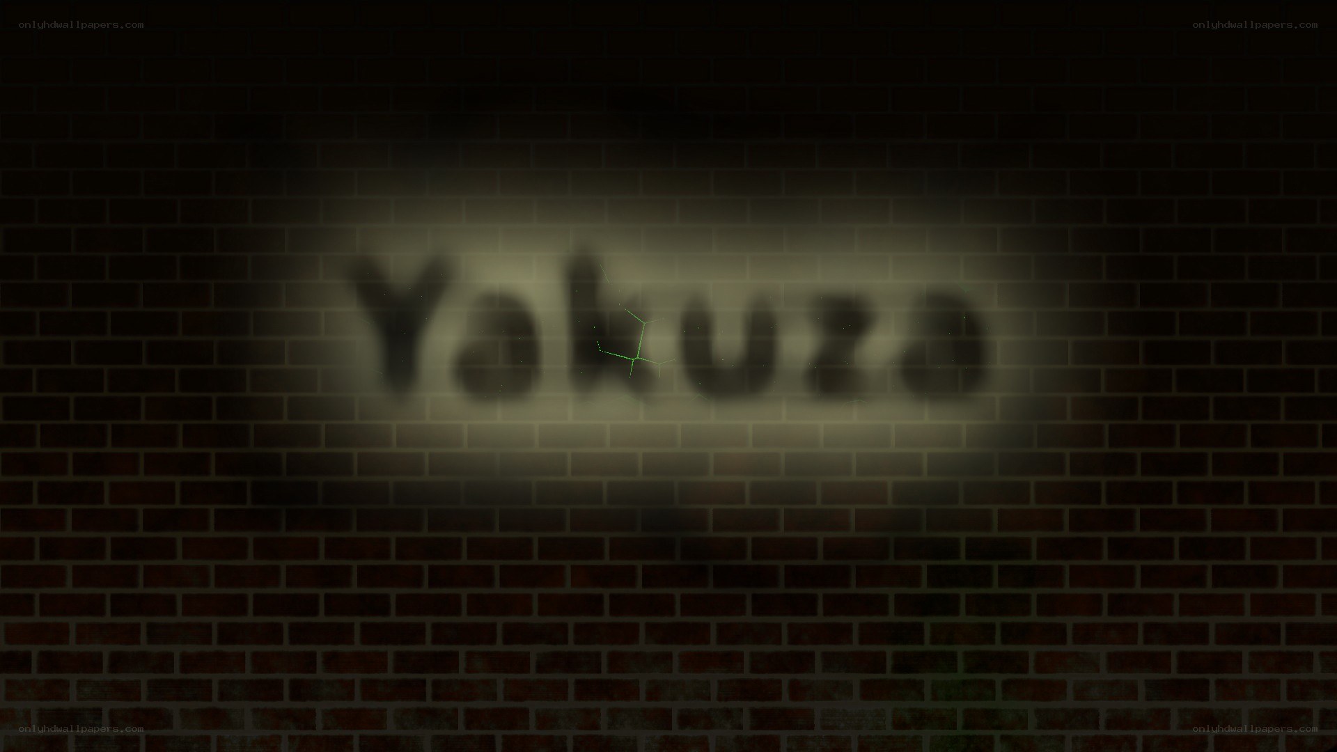 Yakuza text on brick wall