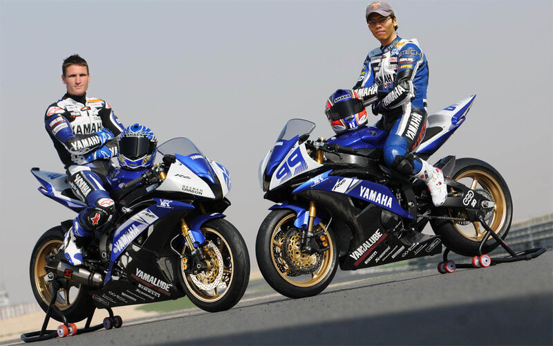 Yamaha motorcycle racers on track