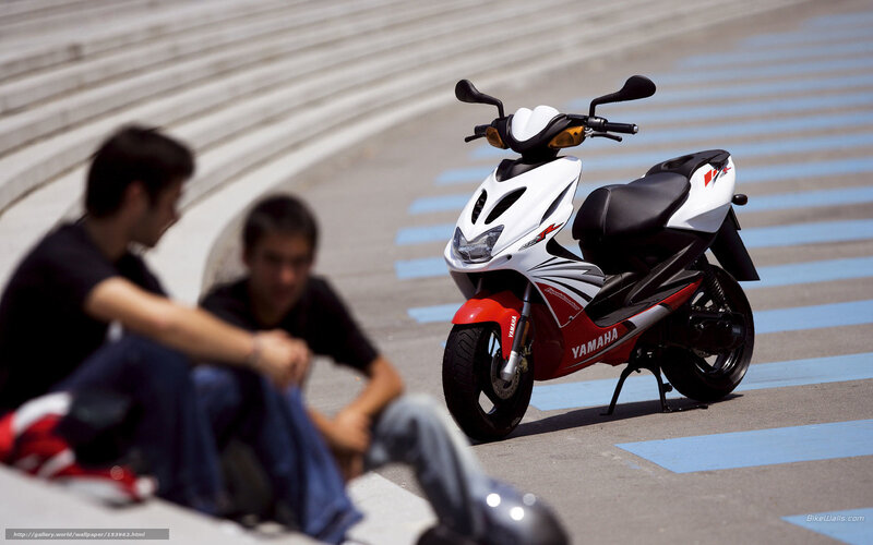 Yamaha scooter on city street