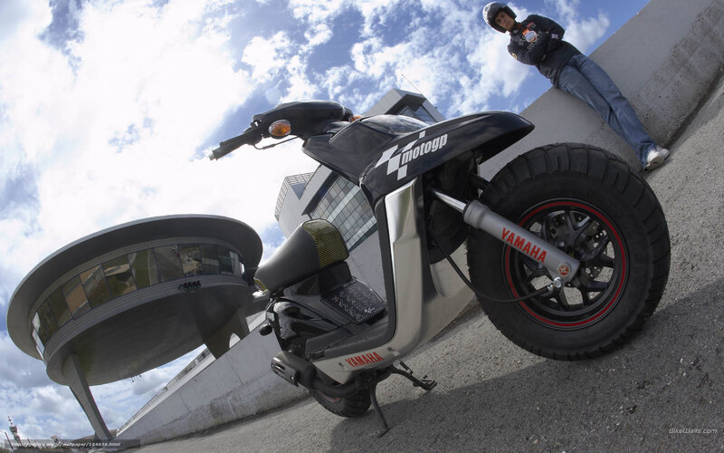 Yamaha scooter with rider