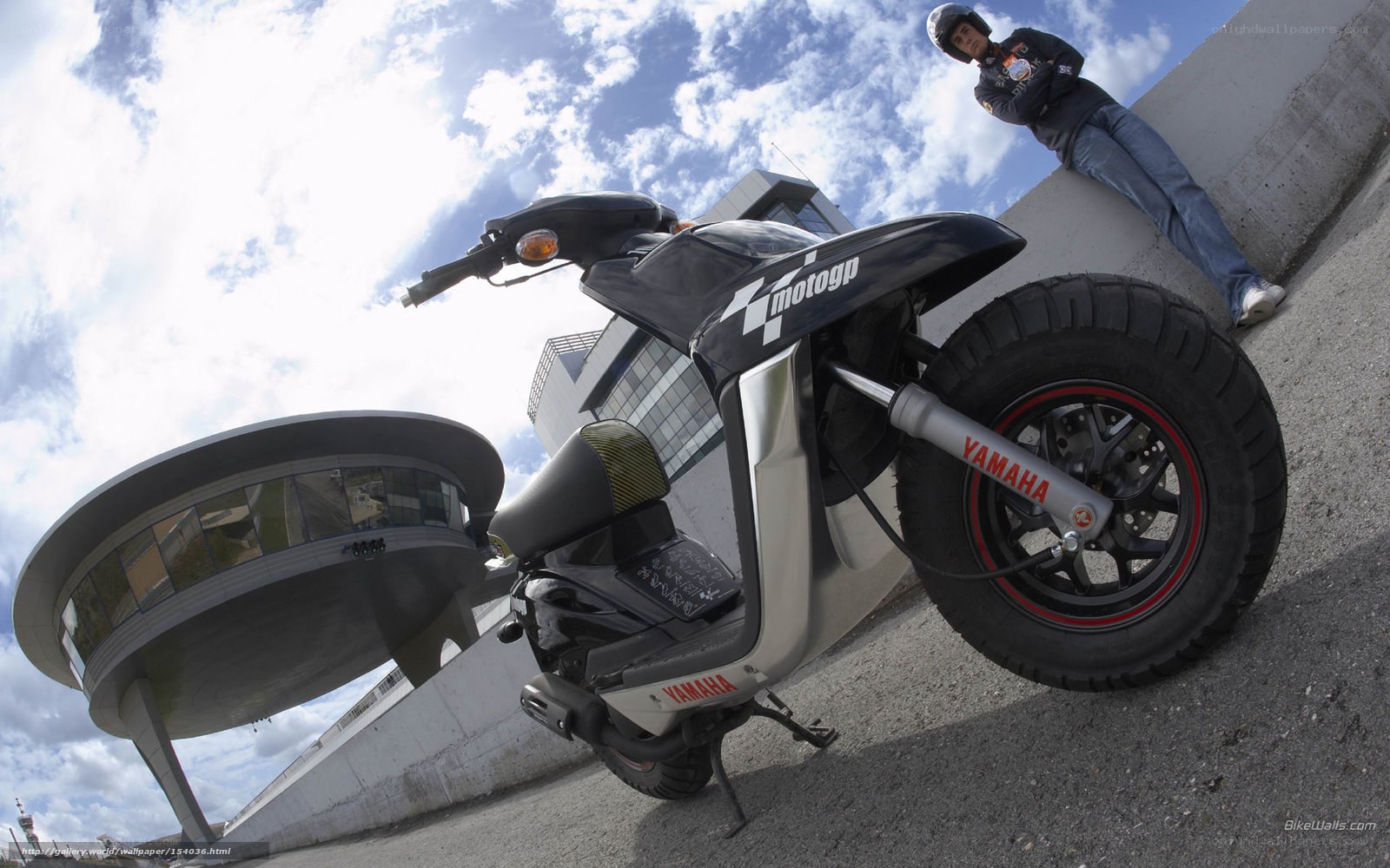 Yamaha scooter with rider