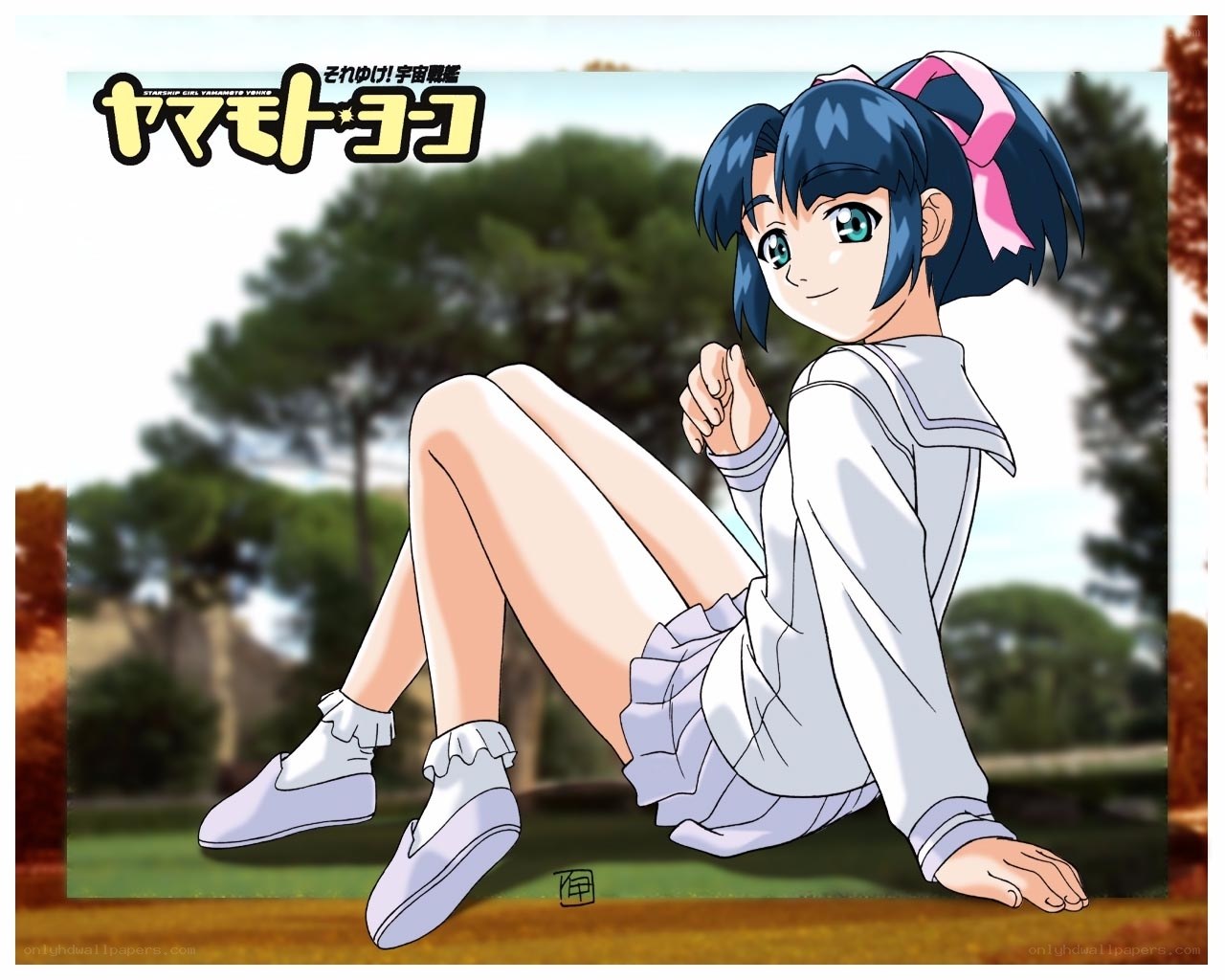 Yamamoto Yoko sitting on grass