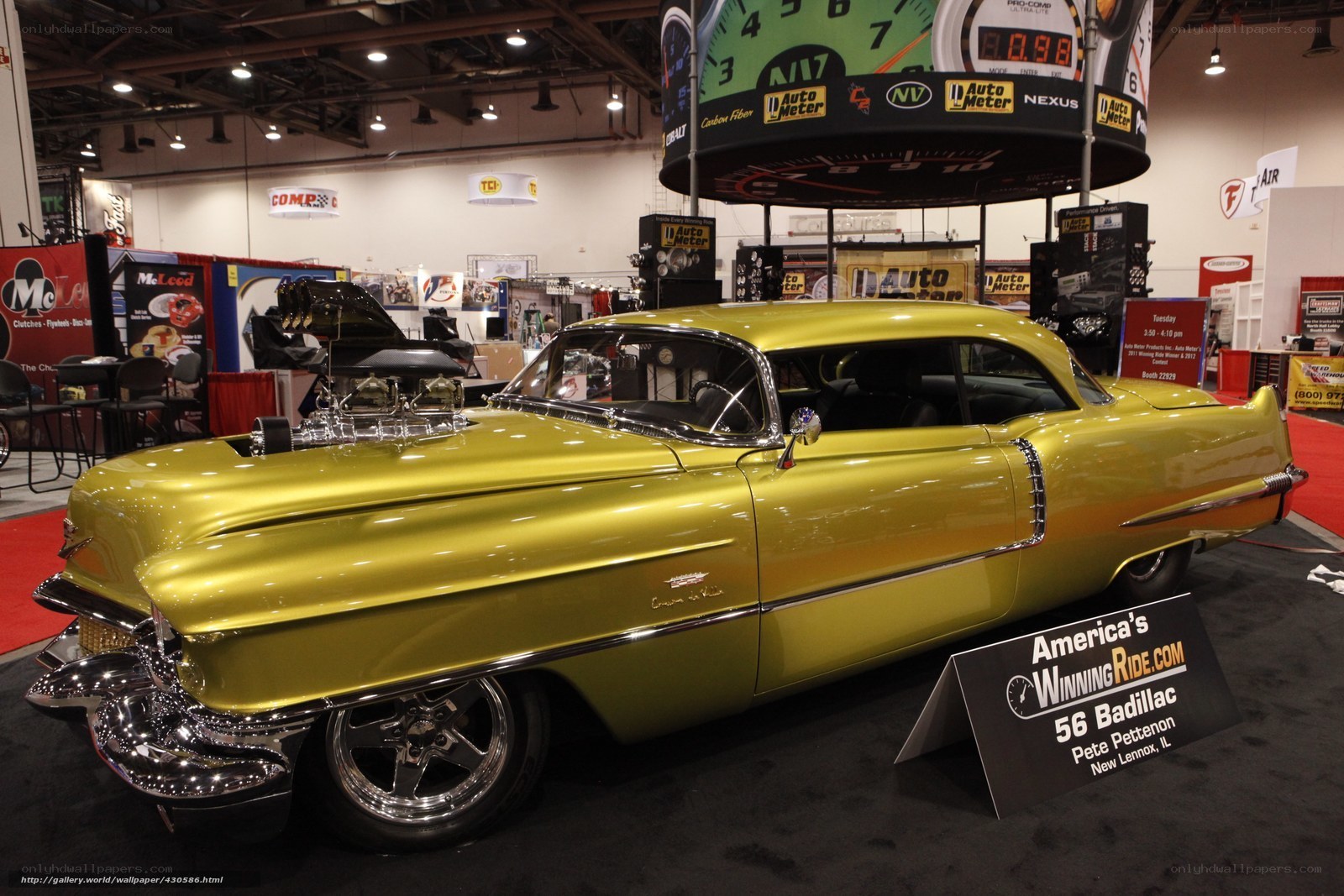 Yellow 1956 Cadillac at car show