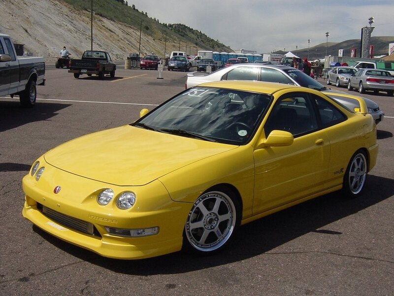 Yellow Acura Integra at car show