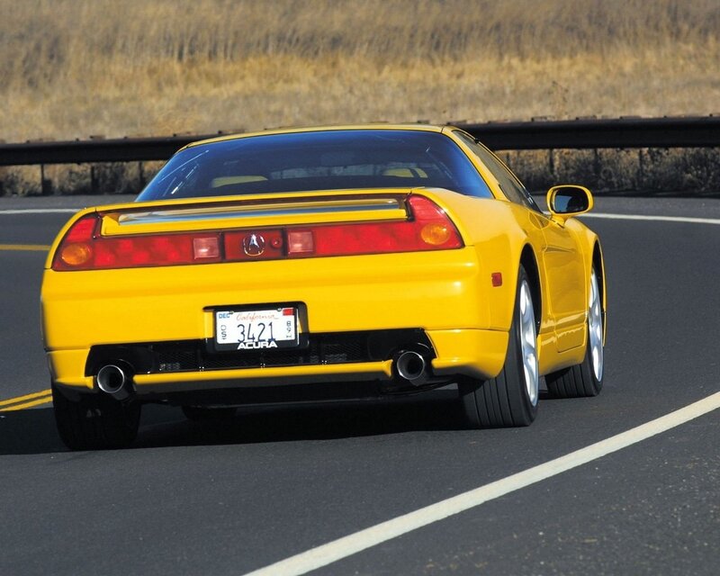 Yellow Acura NSX on road