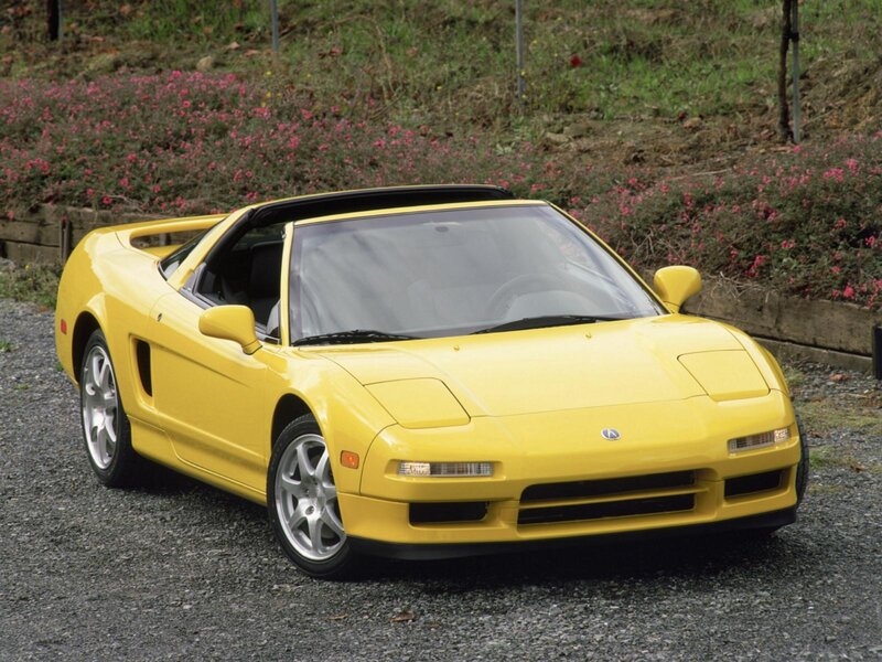yellow Acura NSX sports car