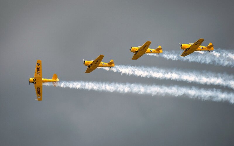 Yellow Aerobatic Planes — Dramatic