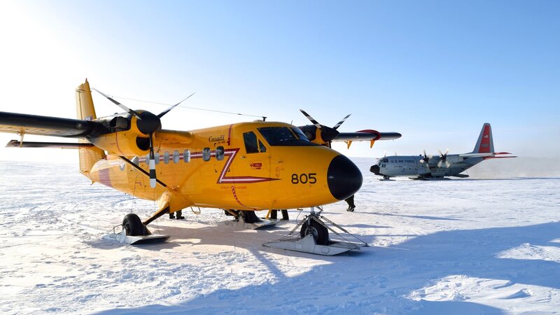 Yellow Aircraft on Snow