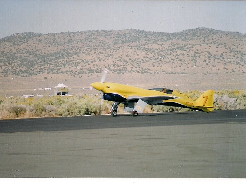 Yellow Airplane on Runway — Calm, Afternoon
