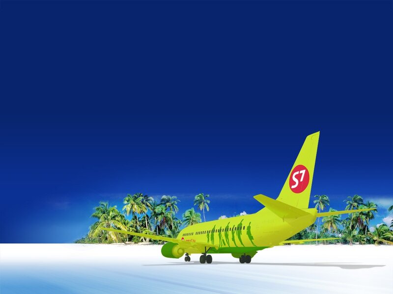 Yellow airplane on tropical beach