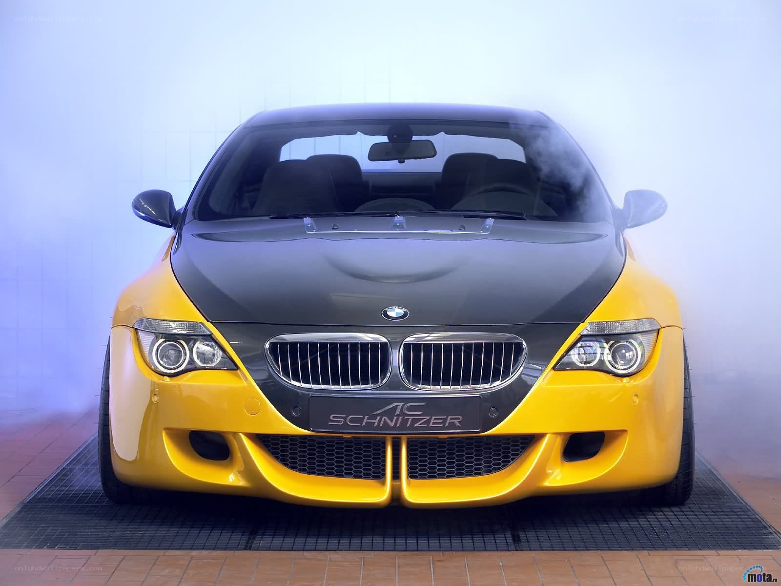 yellow and black BMW car
