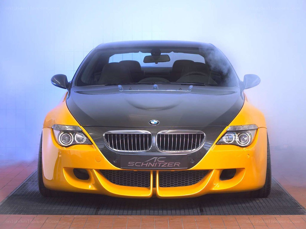 yellow and black BMW car