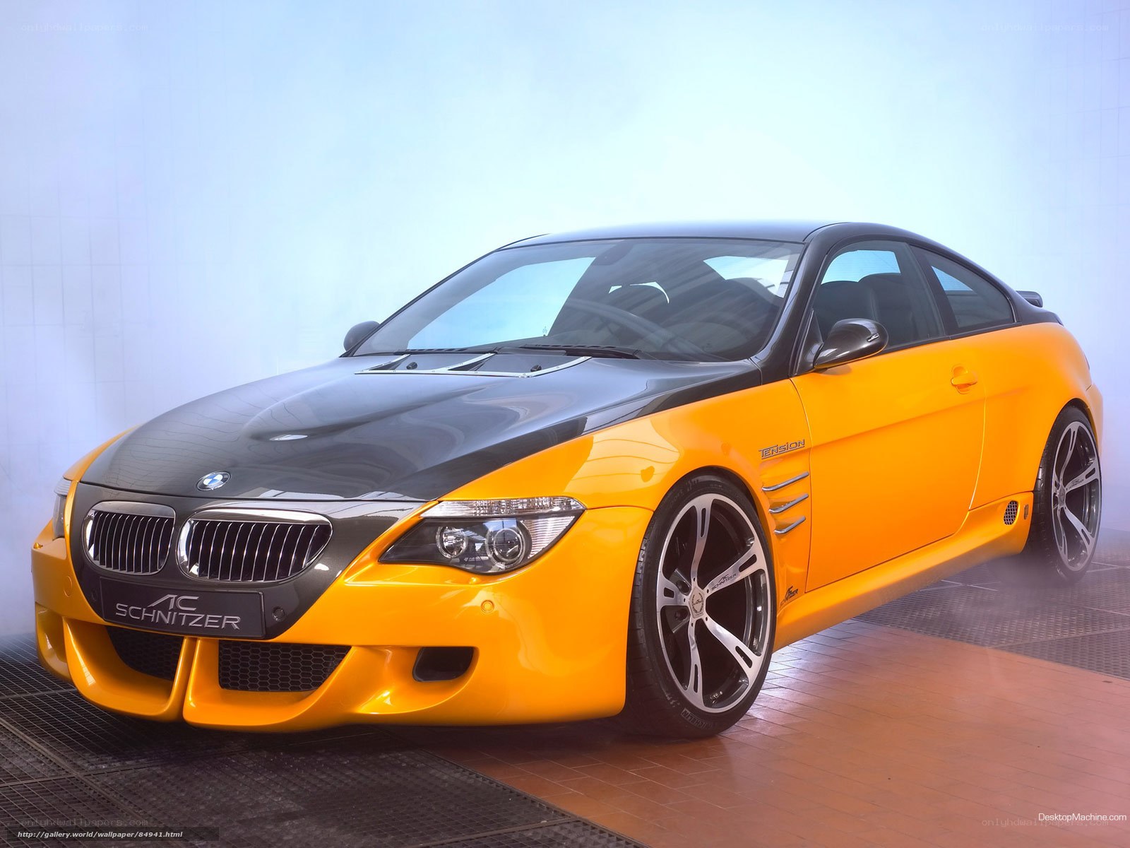 yellow and black BMW coupe