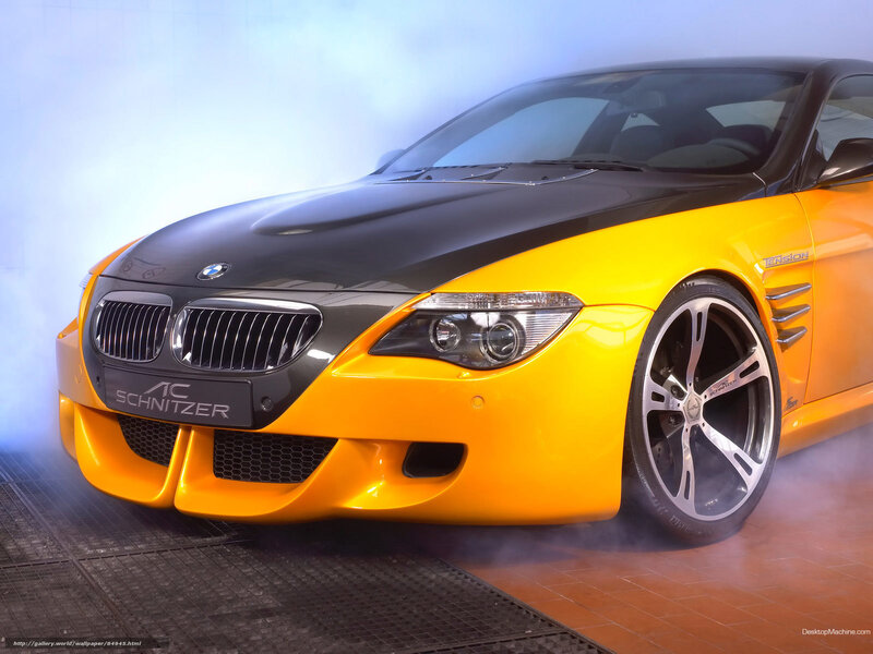 yellow and black BMW sports car
