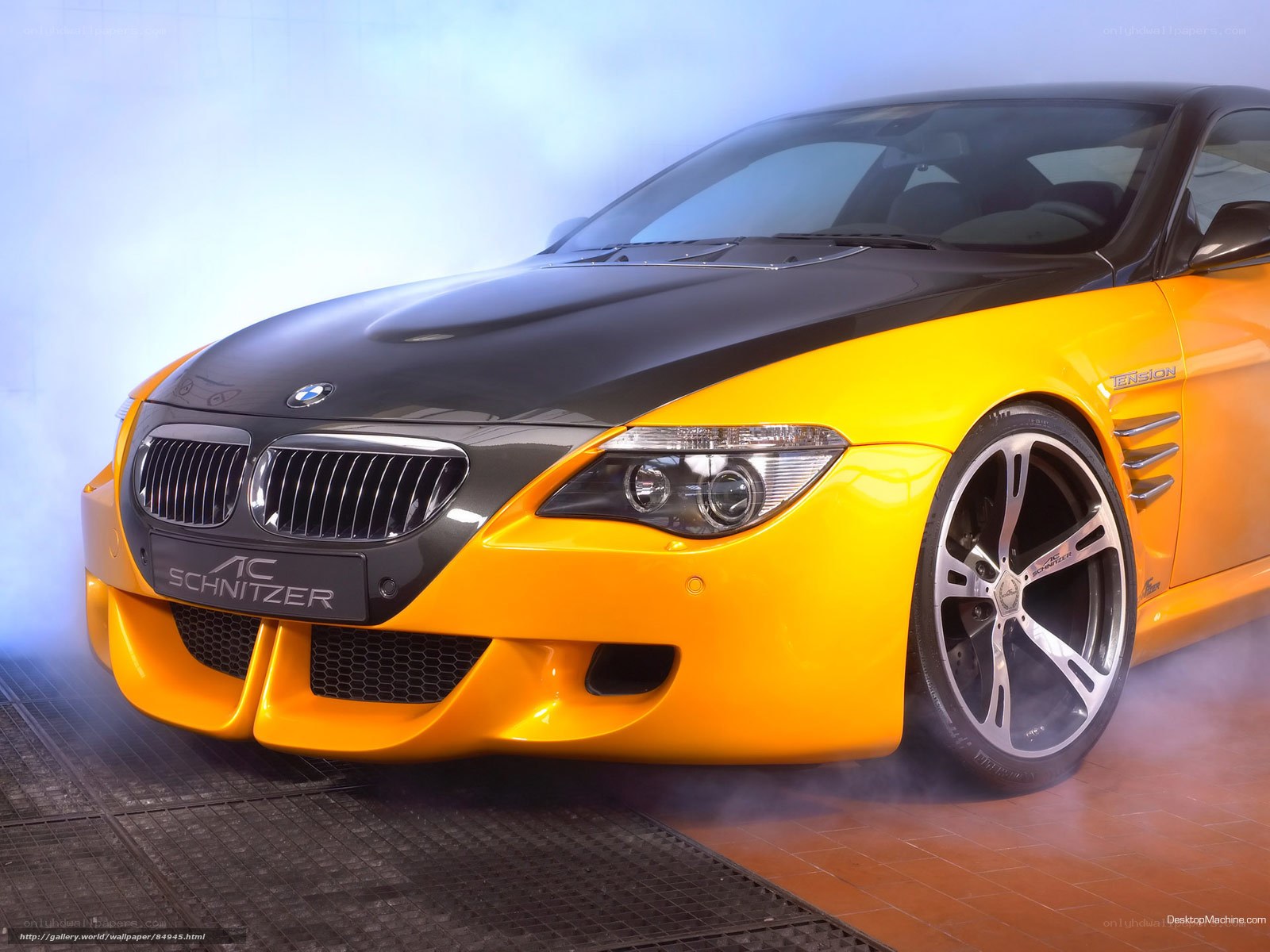 yellow and black BMW sports car