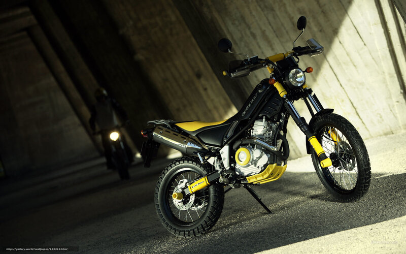 Yellow and black motorcycle in tunnel