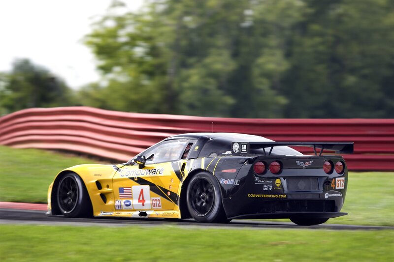 yellow and black race car on track