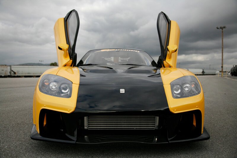 Yellow and Black Sports Car — Dramatic