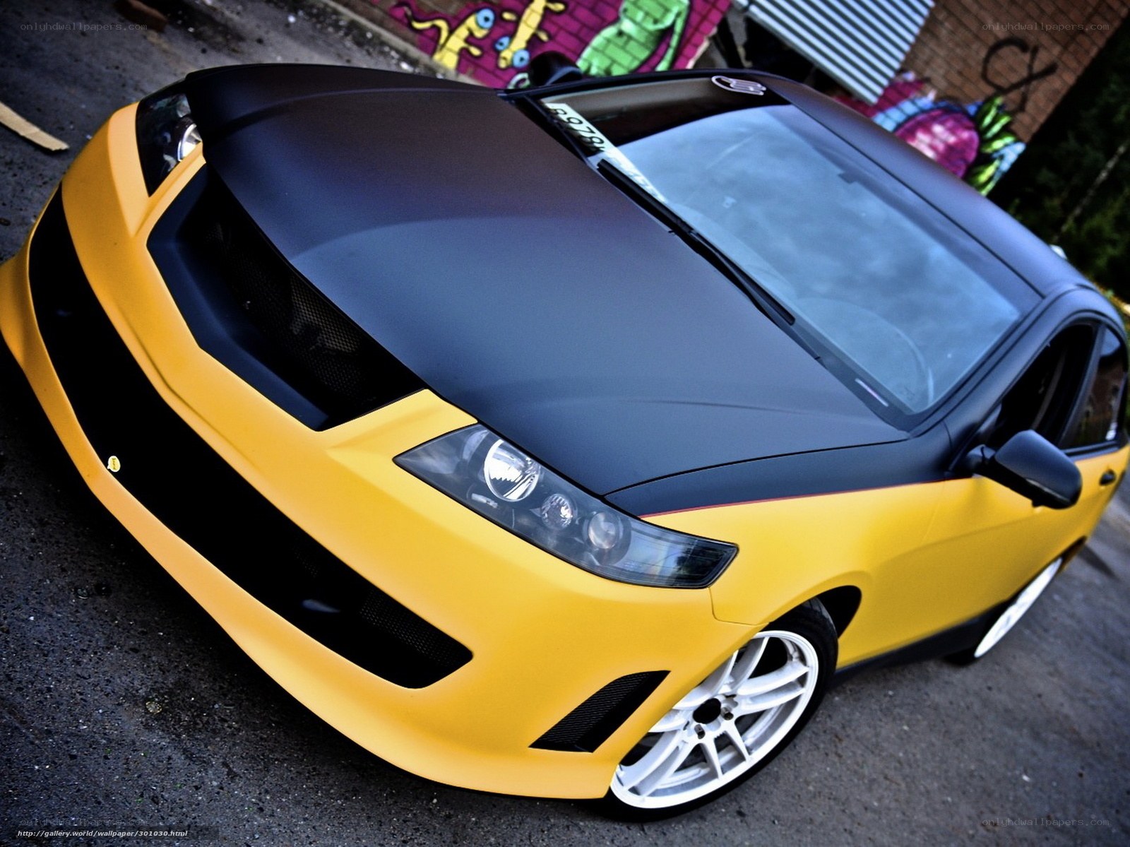 yellow and black sports car