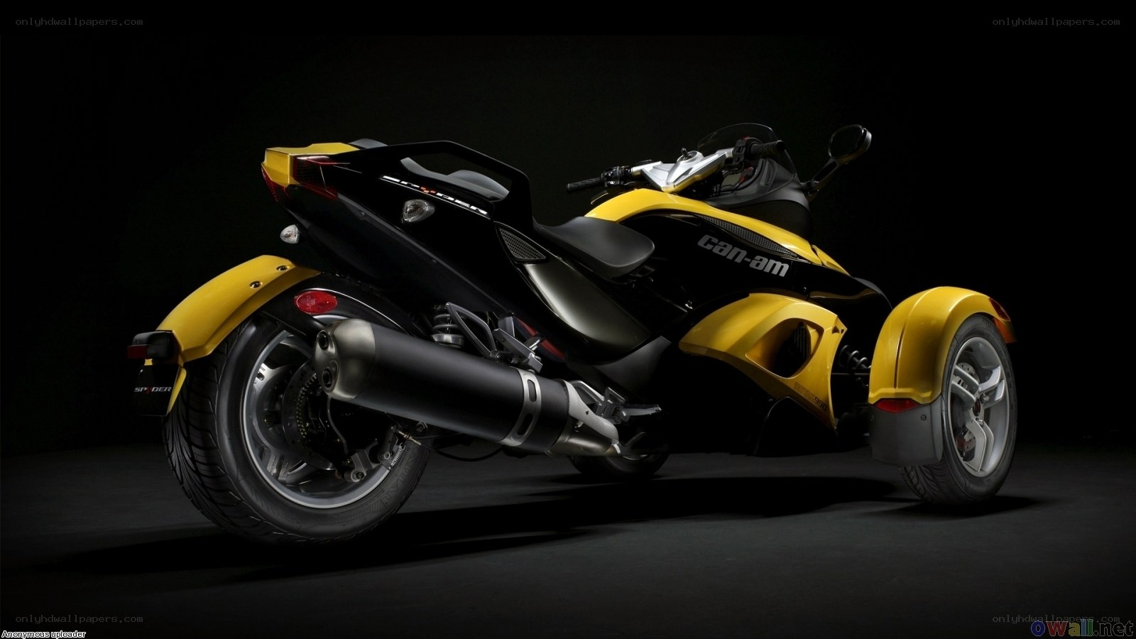 yellow and black three-wheeled motorcycle