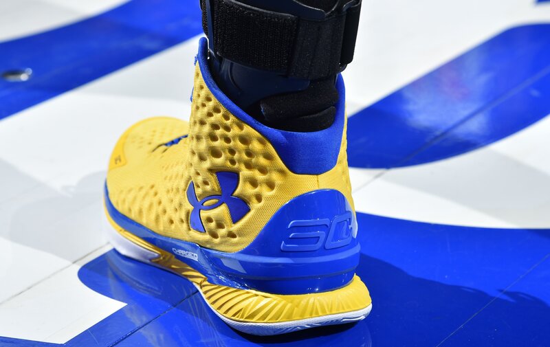 yellow and blue basketball shoe
