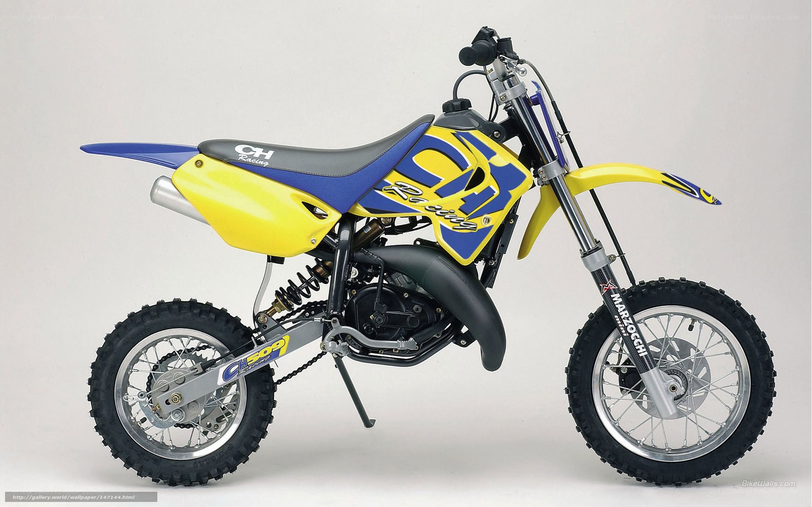 yellow and blue dirt bike
