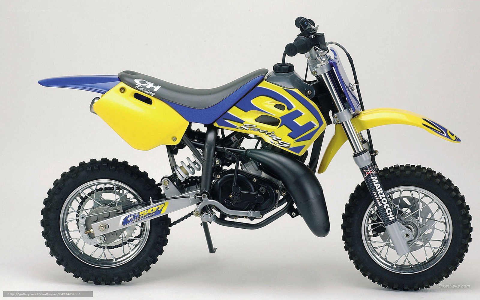 yellow and blue dirt bike