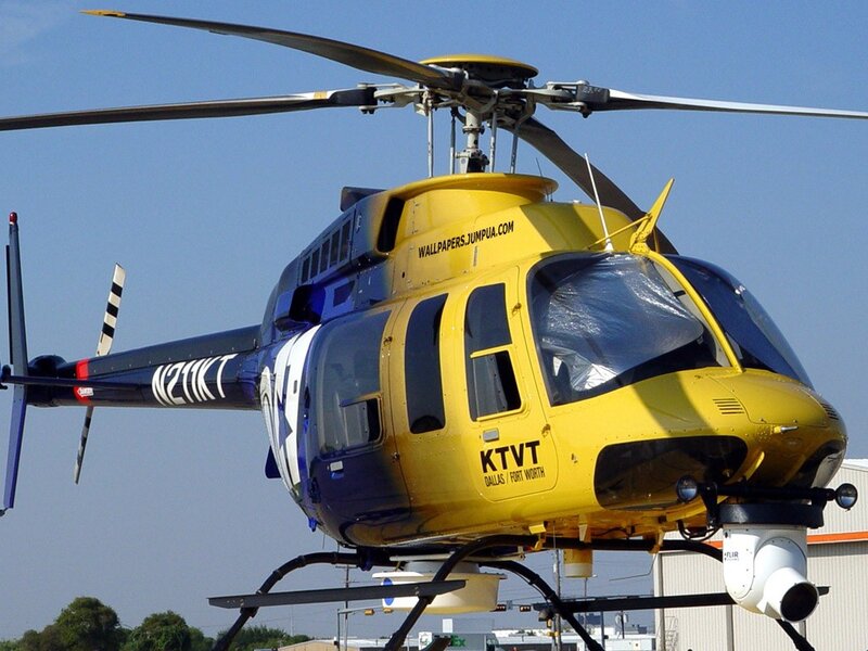 Yellow and blue news helicopter