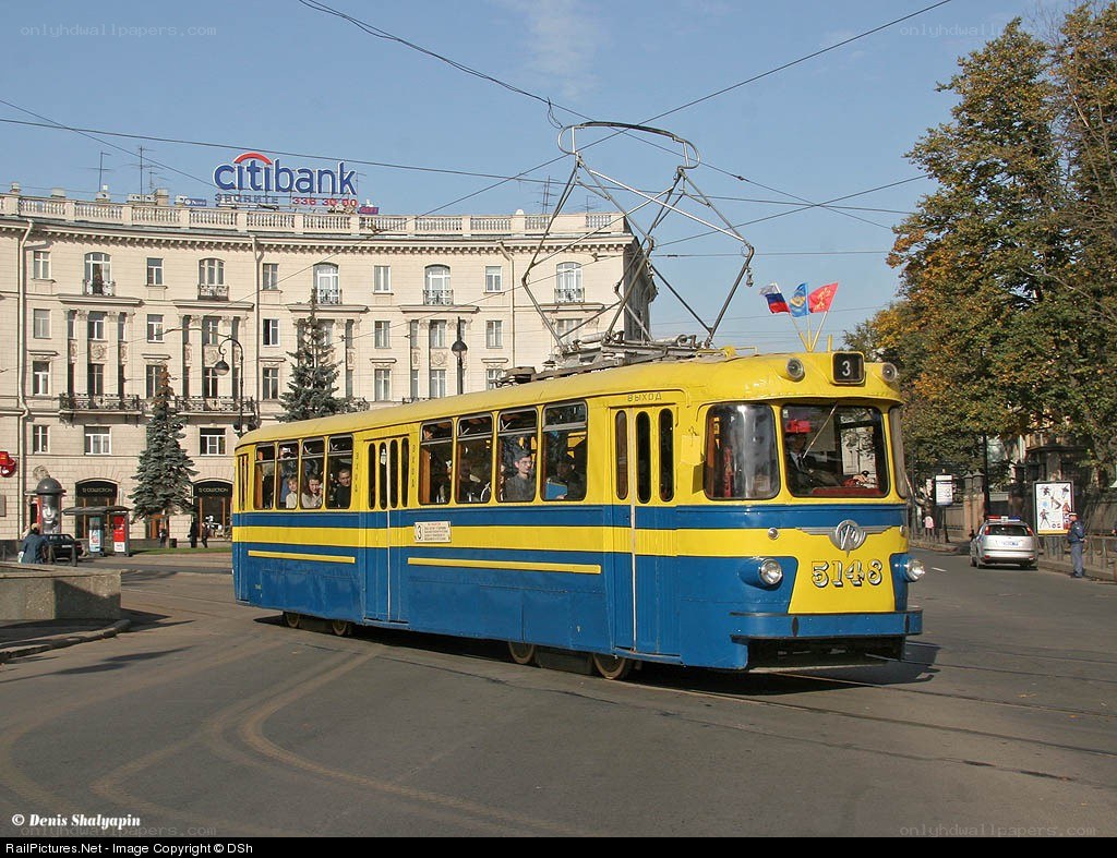 Yellow and blue tram in city