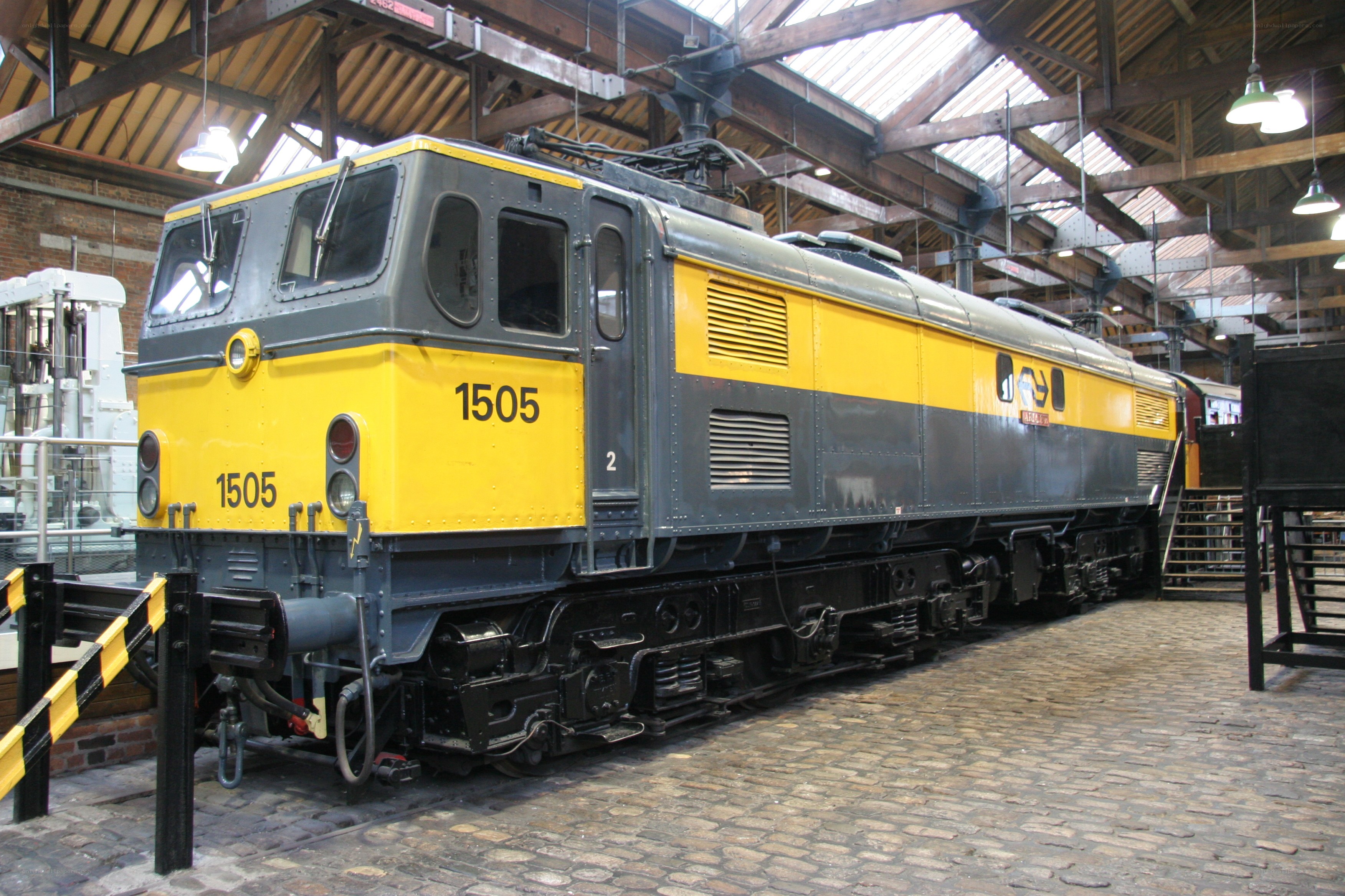 Yellow and gray electric locomotive