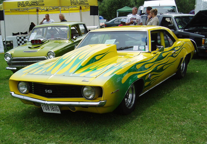 Yellow and green flame car at show