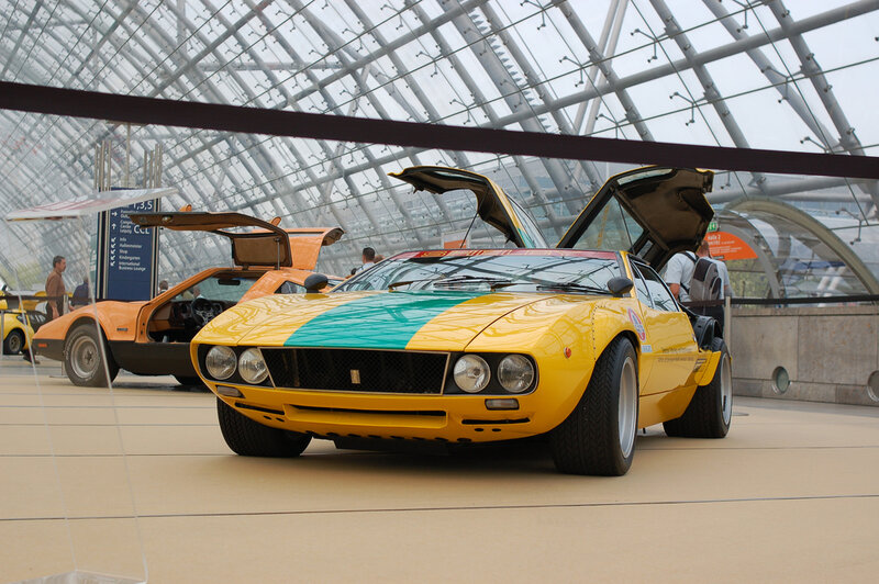 Yellow and orange sports cars on display