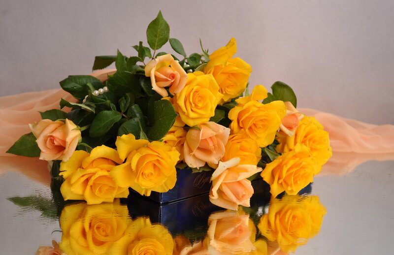 Yellow and peach roses in a bouquet