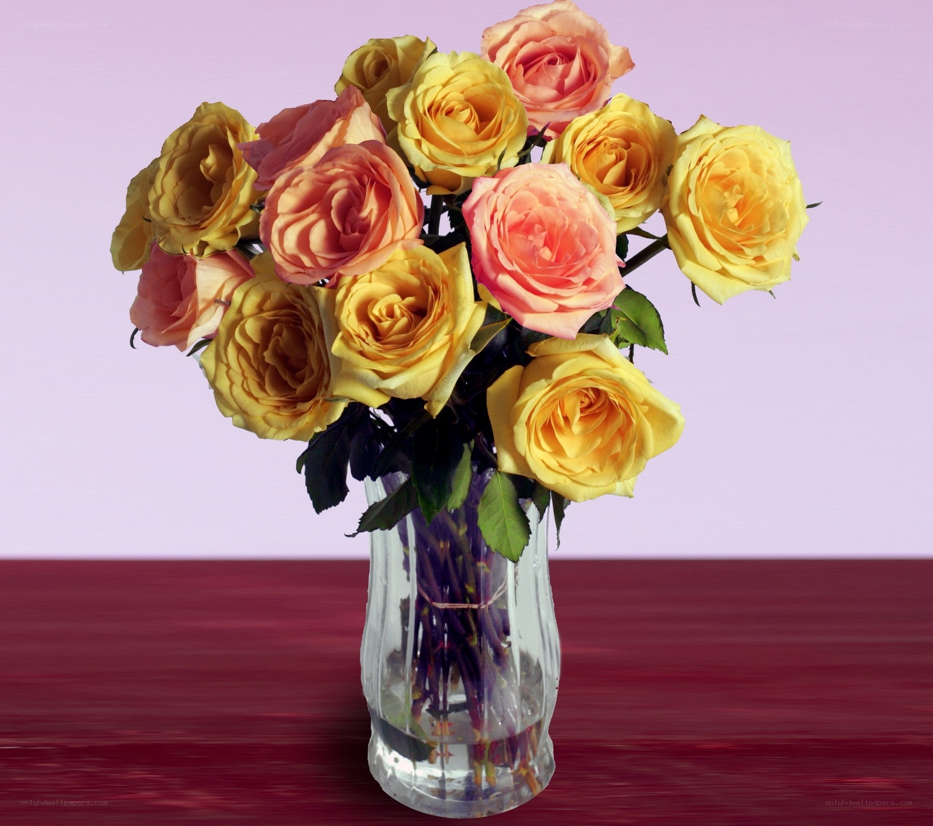 Yellow and pink roses in a vase
