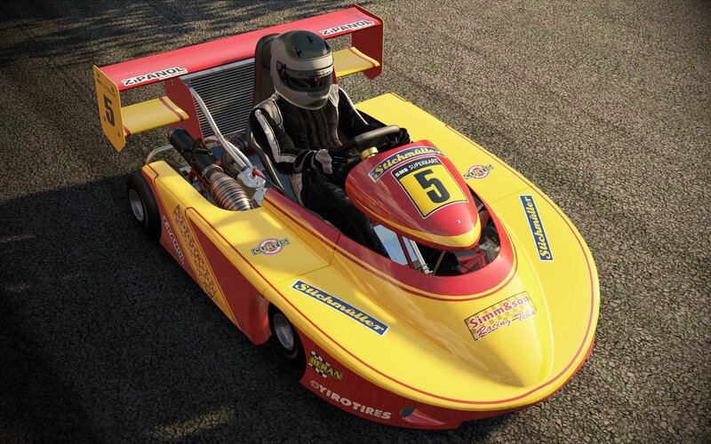 Yellow and red go-kart with driver