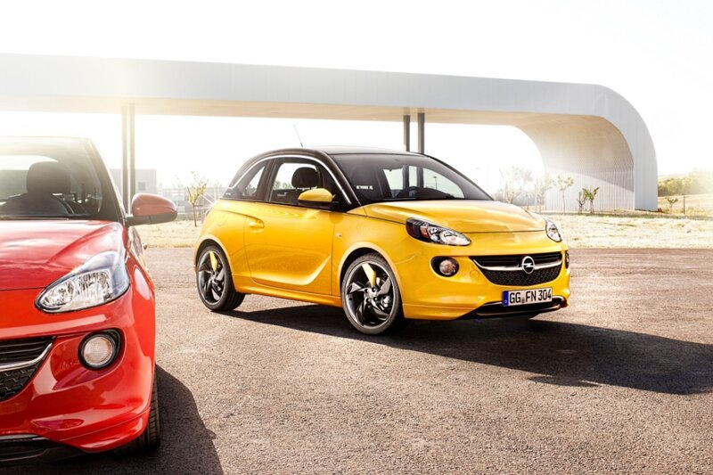 Yellow and red Opel cars