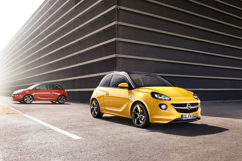 Yellow and red Opel cars