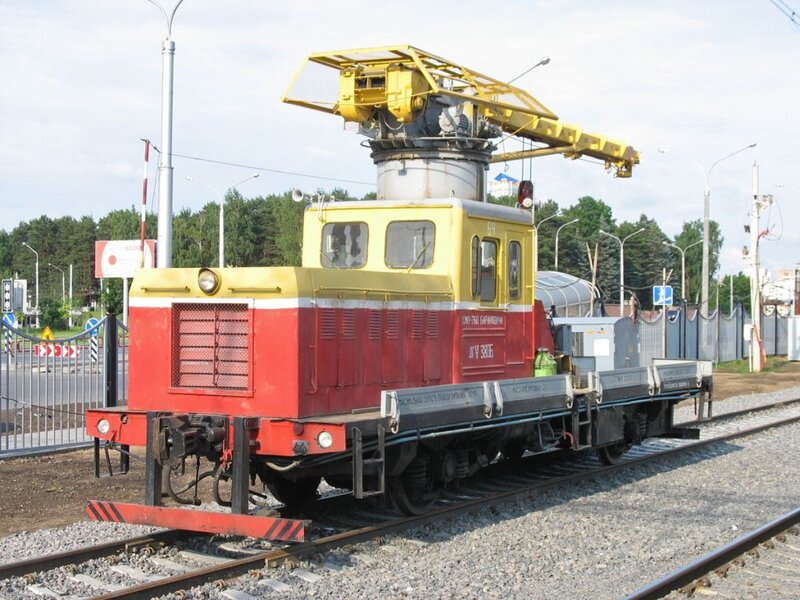 Yellow and Red Rail Vehicle