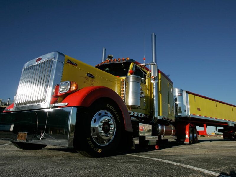 yellow and red semi-truck