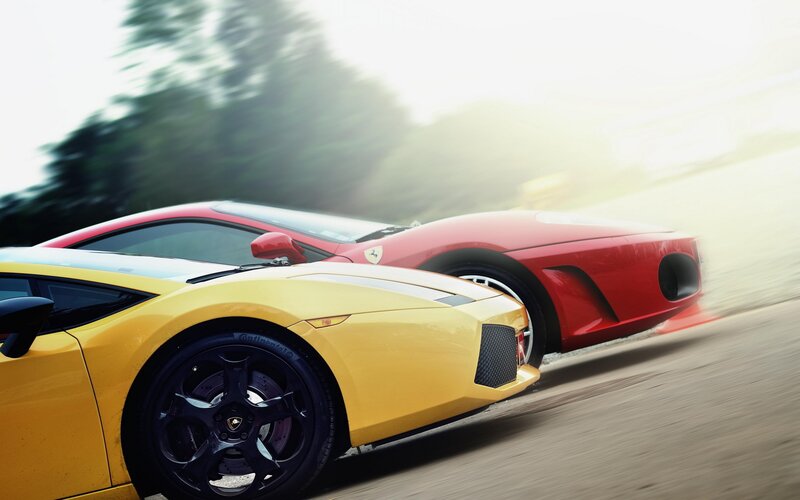 Yellow and red sports cars racing