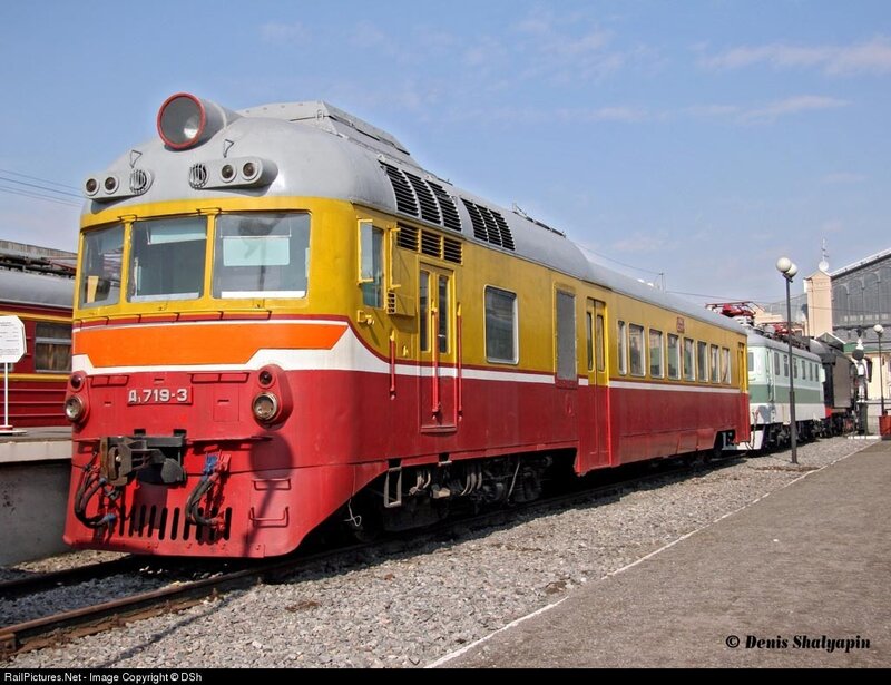 Yellow and red train on display