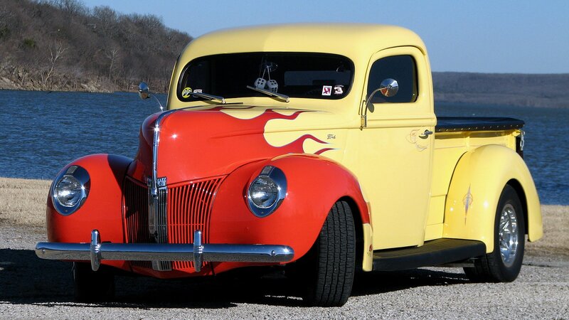 yellow and red vintage pickup truck