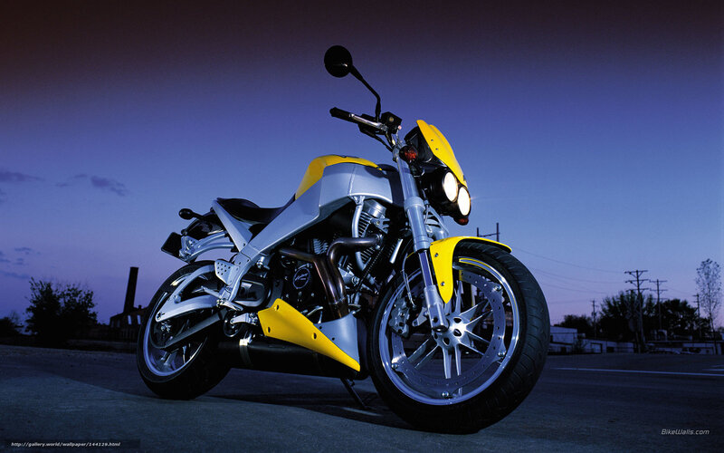 yellow and silver motorcycle at dusk
