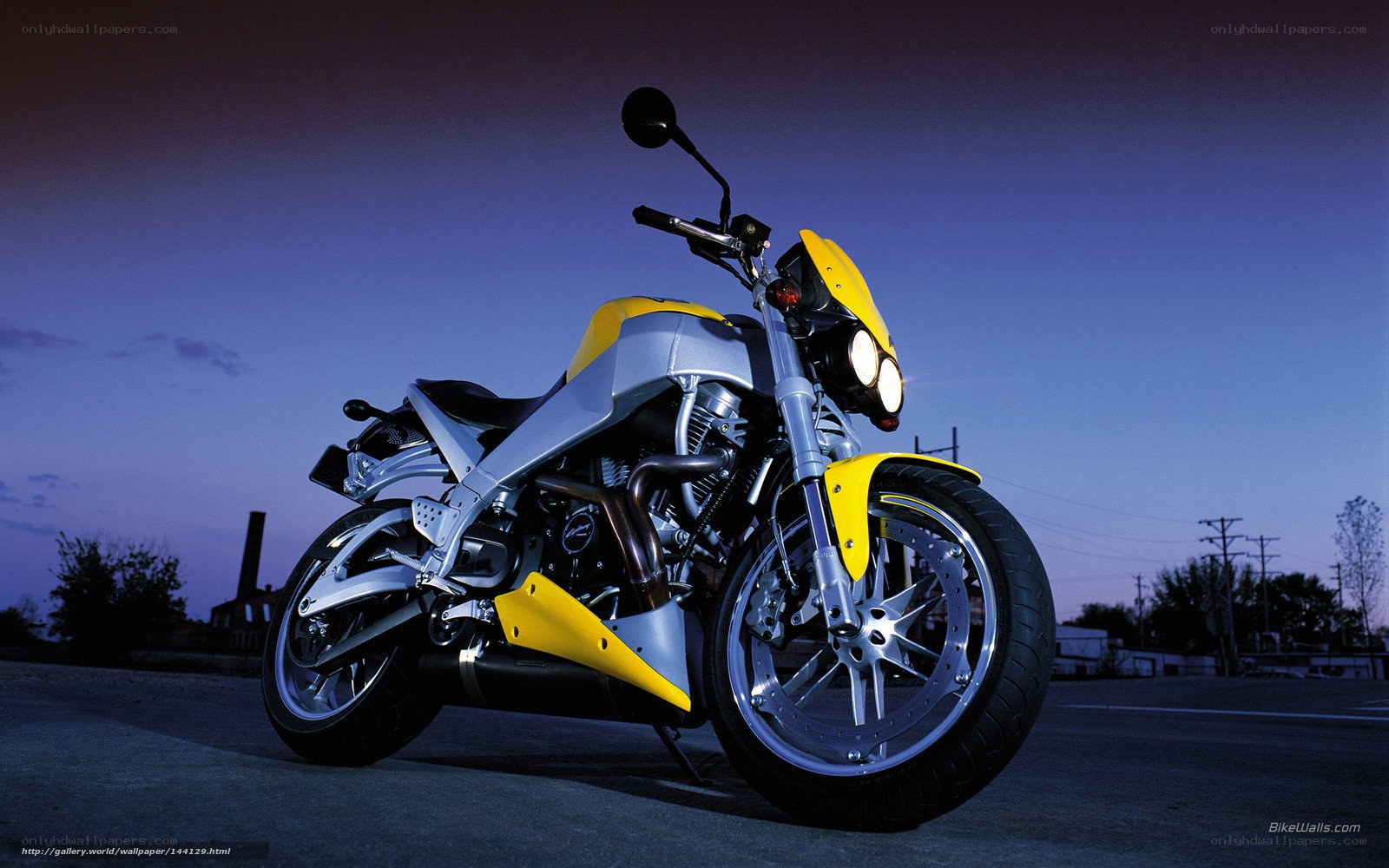 yellow and silver motorcycle at dusk