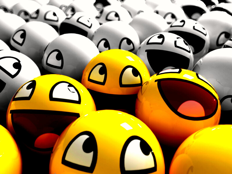 yellow and white emoji spheres