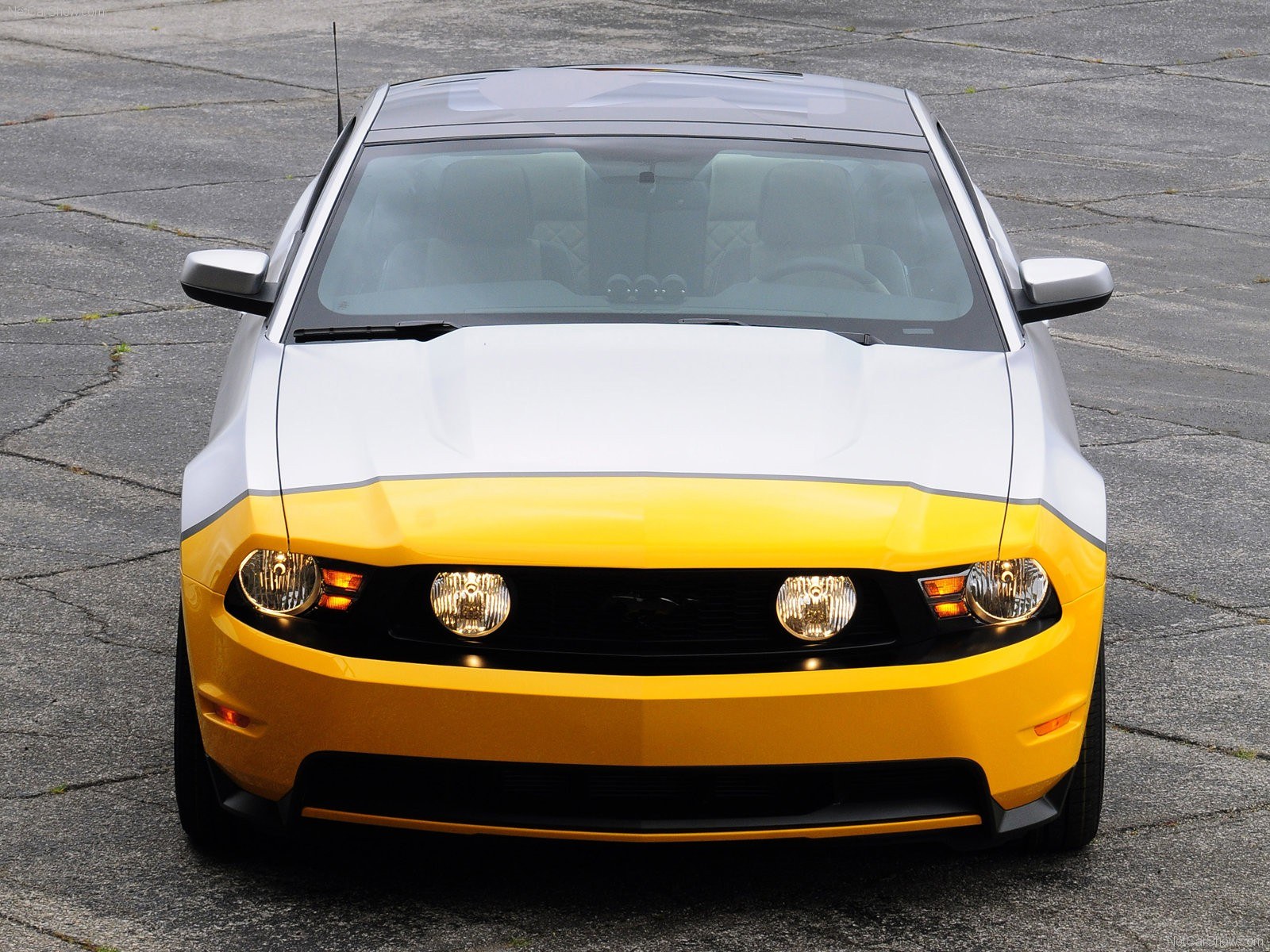 yellow and white ford mustang
